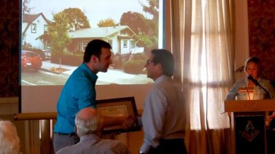 Ralph Wedge of Wedge Roofing receives preservation award from Rob Girola, president of Heritage Homes of Petaluma