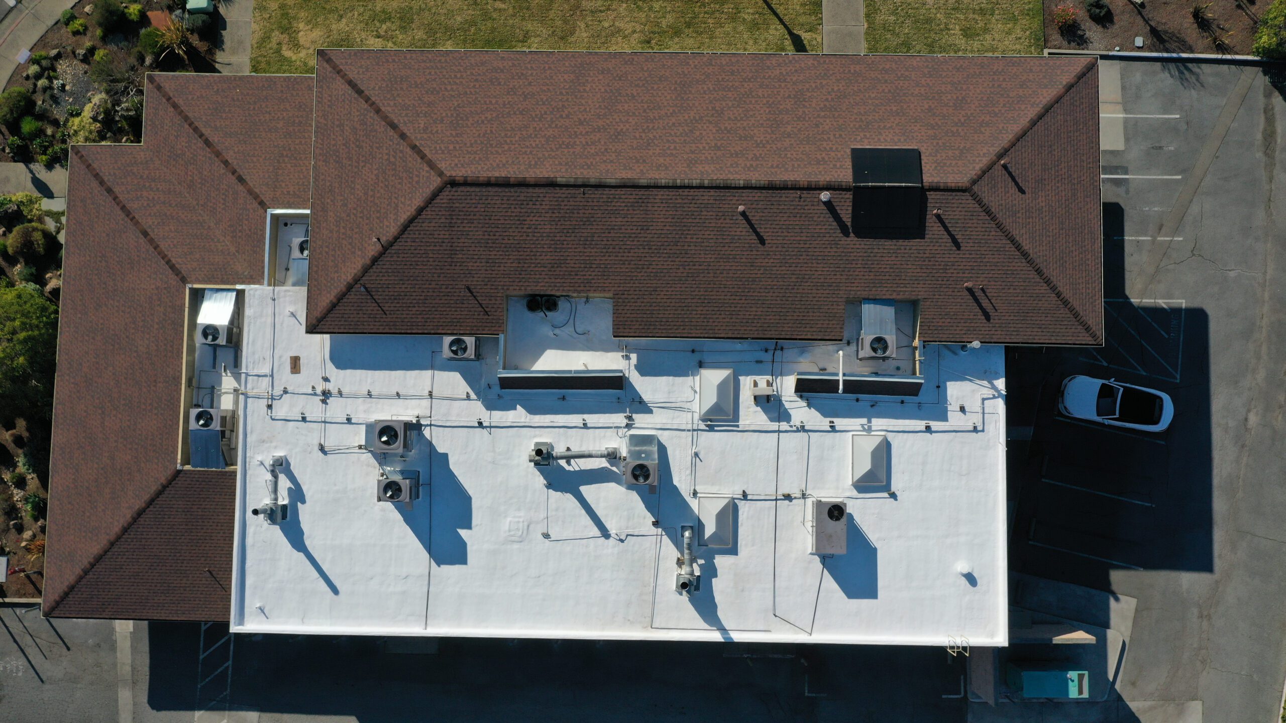 Marin Commercial Roof: GAF Solar Shingles and Spray Foam Roofing