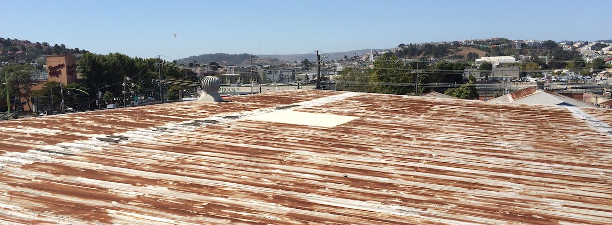 San Francisco commercial roof with rust.